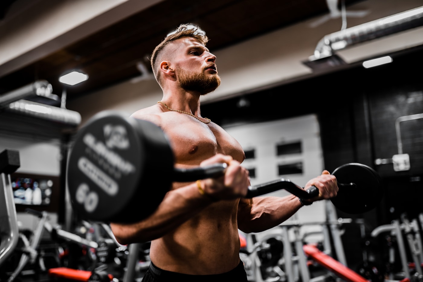 Dumbbell training with a coach nearby